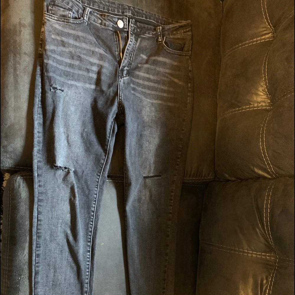 Ripped black jeans wore once